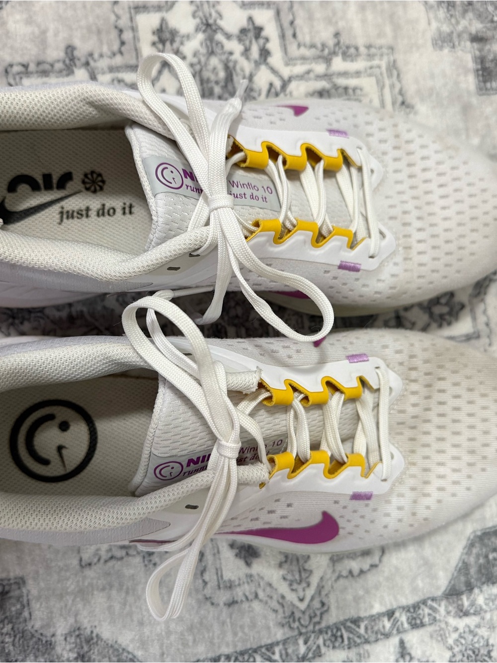 Nike Women's White Running Shoes with Yellow Accents